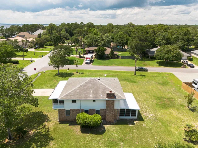 a view of a swimming pool with a lake view