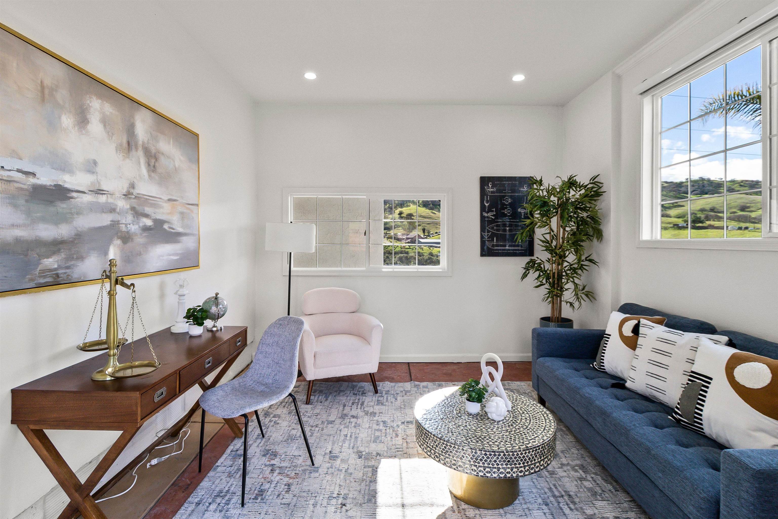 12200 Tesla Road Livermore, CA 94550 - Photo 18 of 60 a living room with furniture and a potted plant