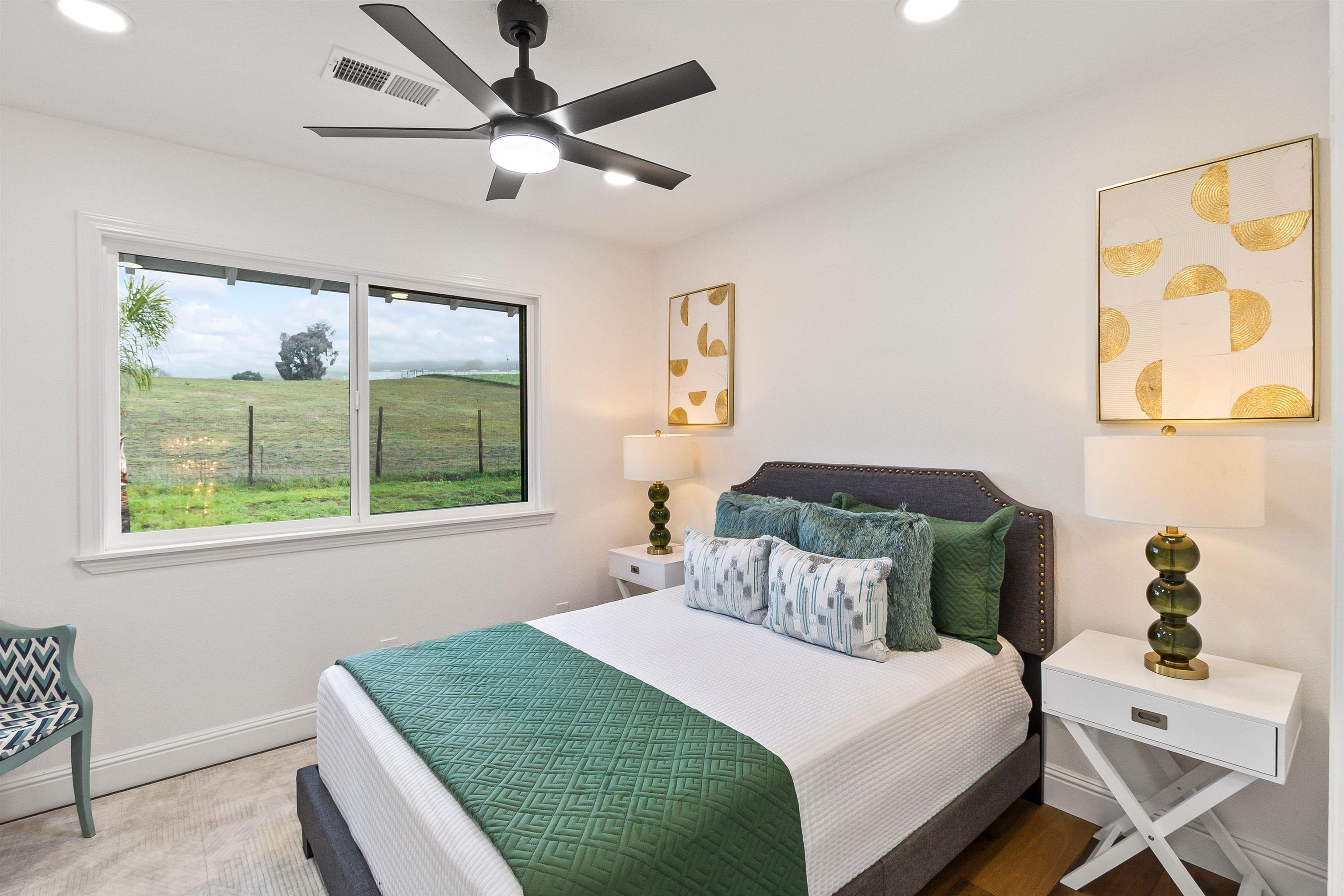 12200 Tesla Road Livermore, CA 94550 - Photo 31 of 60 a bedroom with a bed and a window