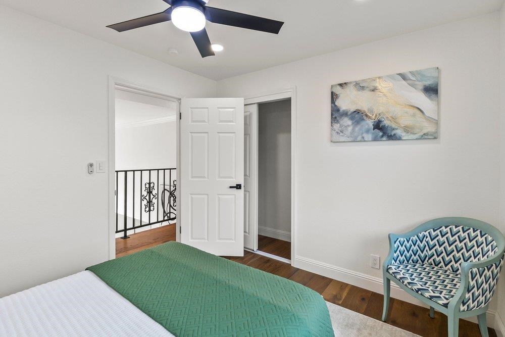 12200 Tesla Road Livermore, CA 94550 - Photo 32 of 60 a view of a bedroom with furniture and wooden floor