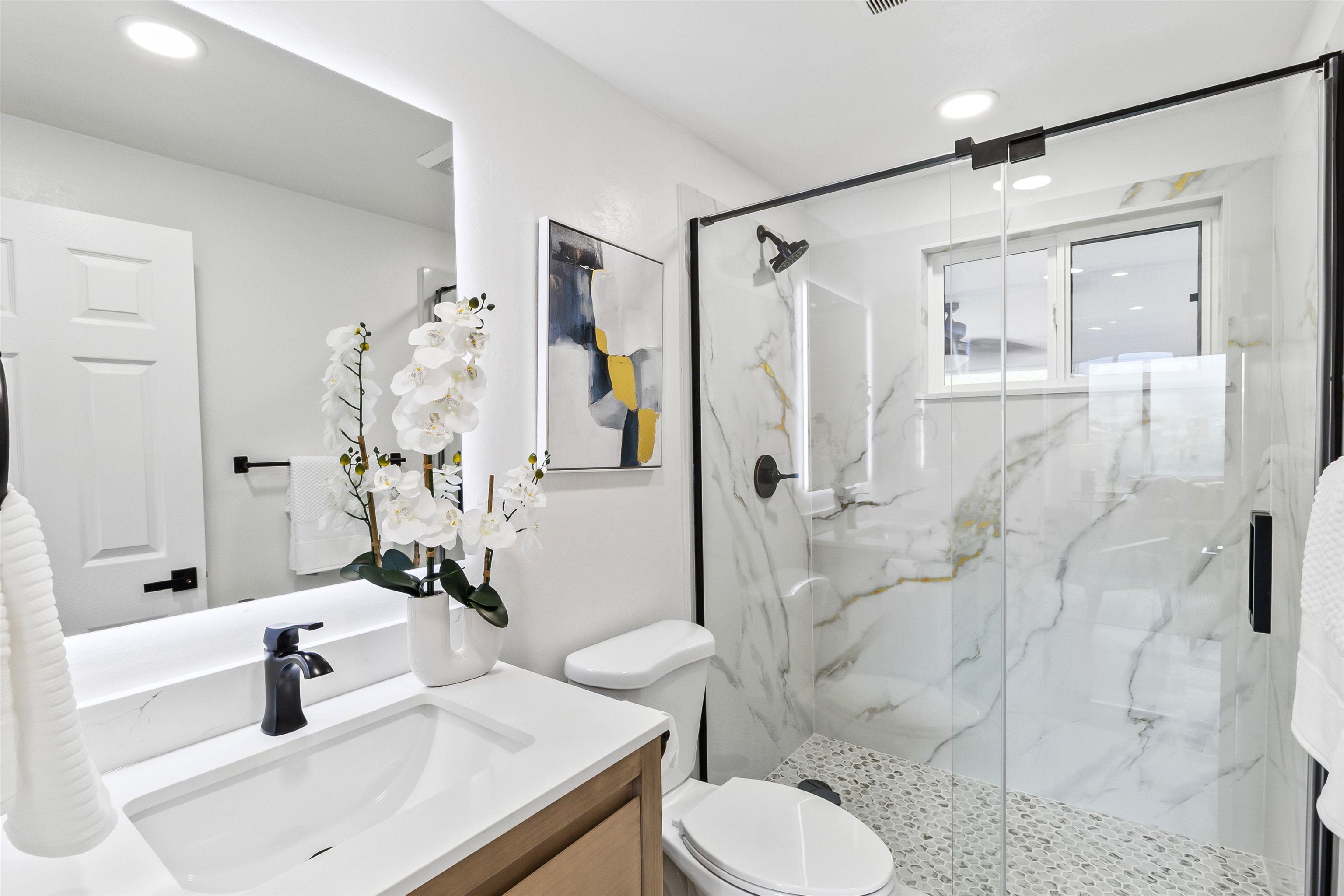 12200 Tesla Road Livermore, CA 94550 - Photo 39 of 60 a bathroom with a sink toilet and shower