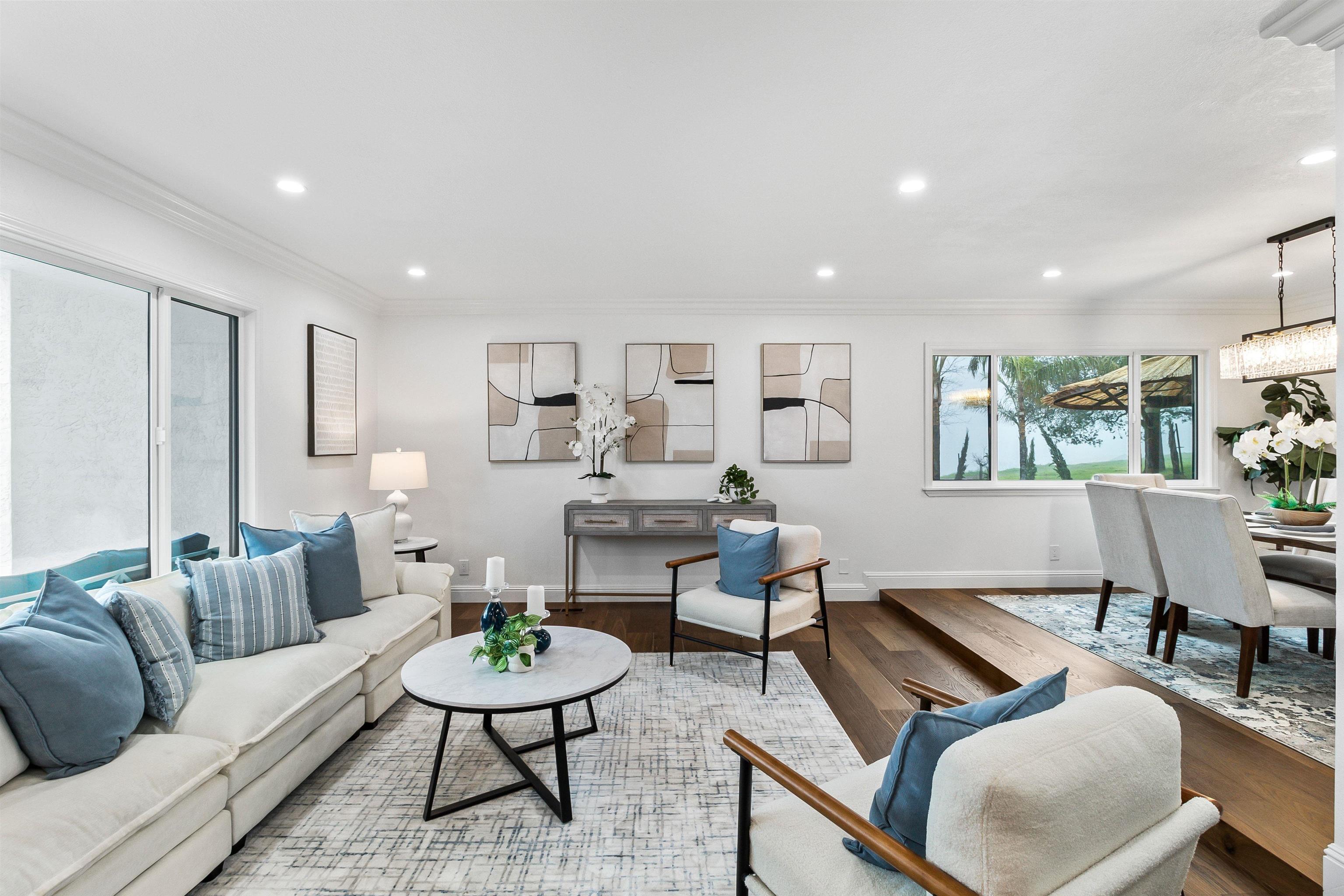 12200 Tesla Road Livermore, CA 94550 - Photo 7 of 60 a living room with furniture and a wooden floor