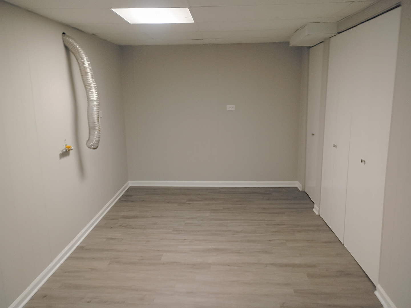 4245 West 78th Street Chicago, IL 60652 - Photo 20 of 21 a view of a room with wooden floor