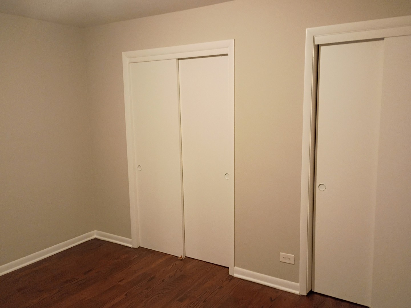 4245 West 78th Street Chicago, IL 60652 - Photo 8 of 21 an empty room with wooden floor and closet