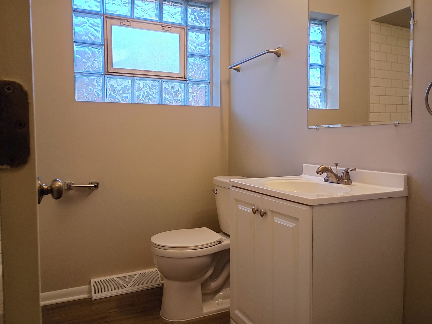 4245 West 78th Street Chicago, IL 60652 - Photo 9 of 21 a bathroom with a sink and a toilet