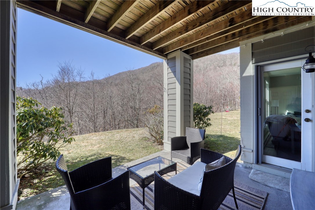 1355 7 Devils Road, Unit 302 Seven Devils, NC 28604 - Photo 36 of 44 a view of outdoor space yard and patio