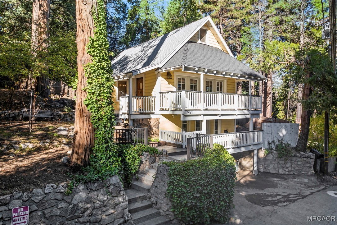 784 Sierra Vista Drive Twin Peaks, CA 92391 - Photo 2 of 17 a aerial view of a house with a yard