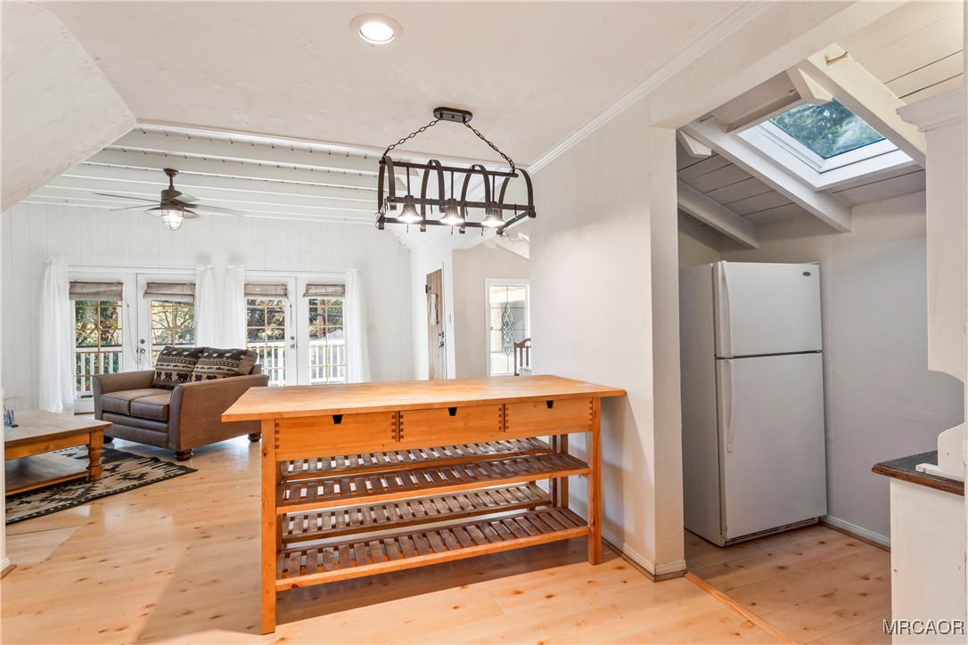 784 Sierra Vista Drive Twin Peaks, CA 92391 - Photo 7 of 17 a view of a bedroom with furniture and a window