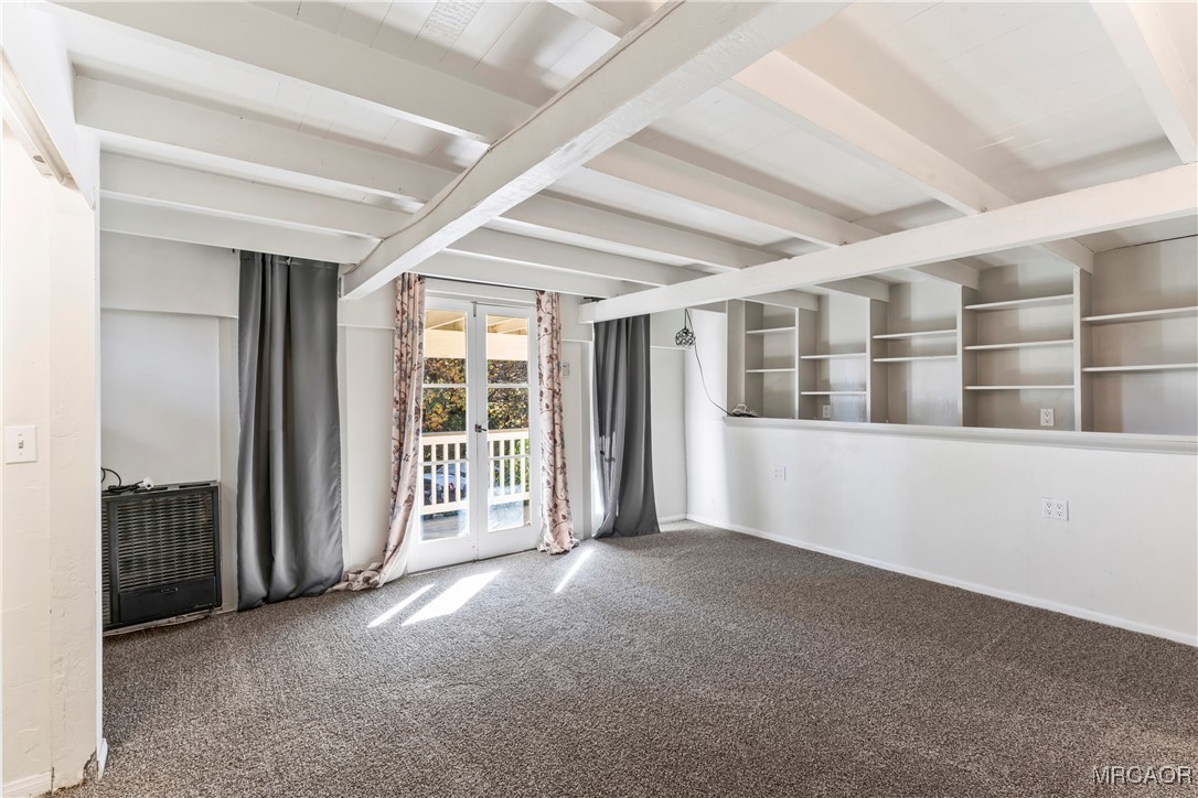 784 Sierra Vista Drive Twin Peaks, CA 92391 - Photo 9 of 17 a view of an empty room with a window