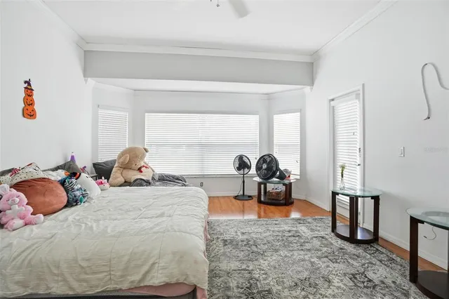 a bed room with a bed and a couch