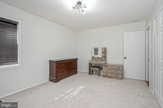 a bathroom with a shower and a toilet