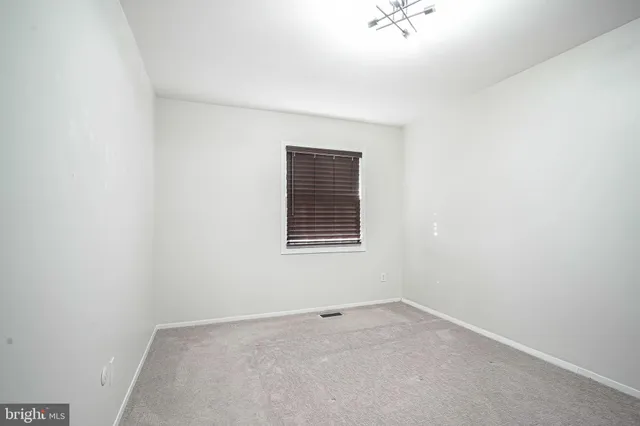 a view of a hallway with workspace