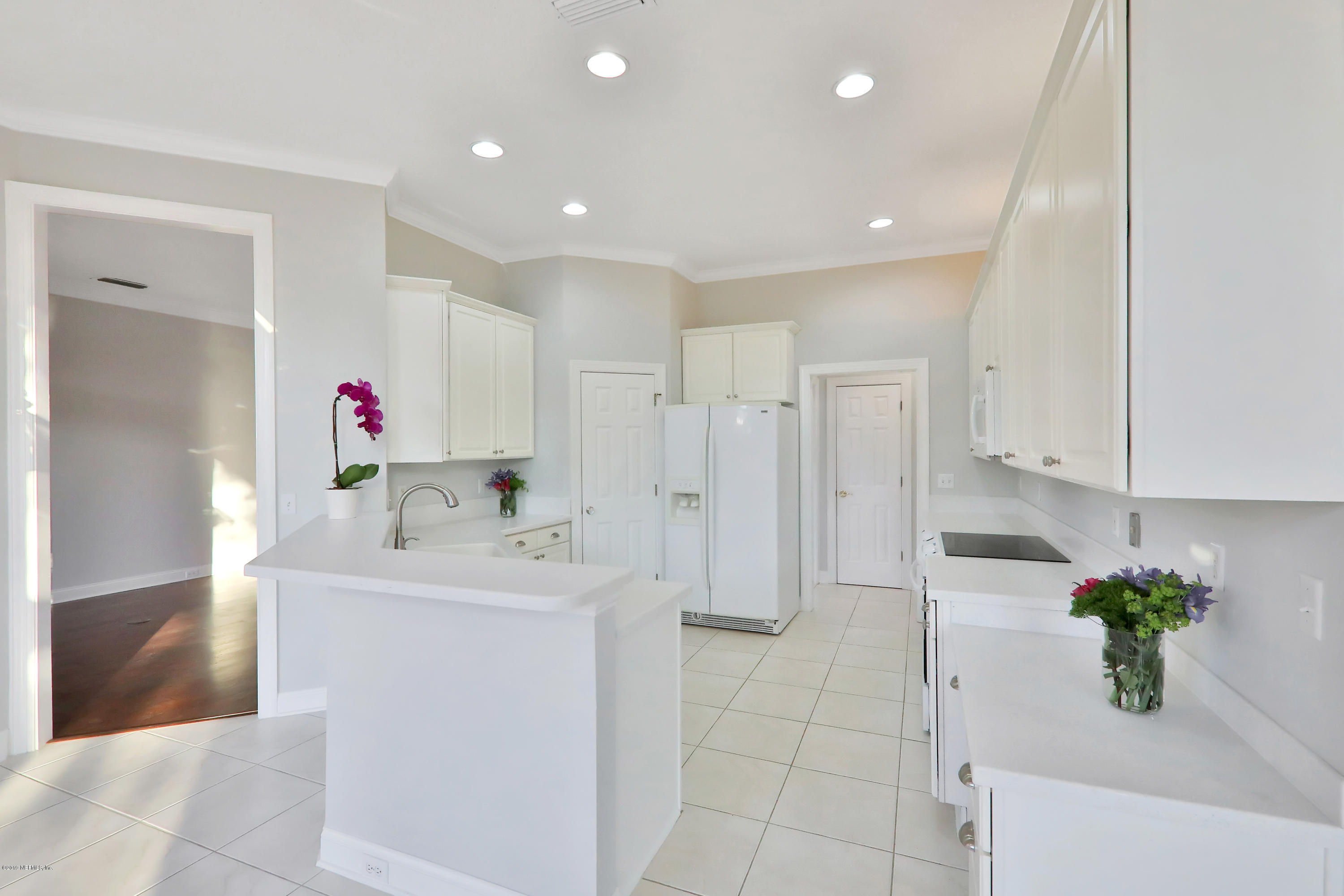 1444 Course View Drive Fleming Island, FL 32003 - Photo 36 of 61 a bathroom with a sink vanity granite tub and shower