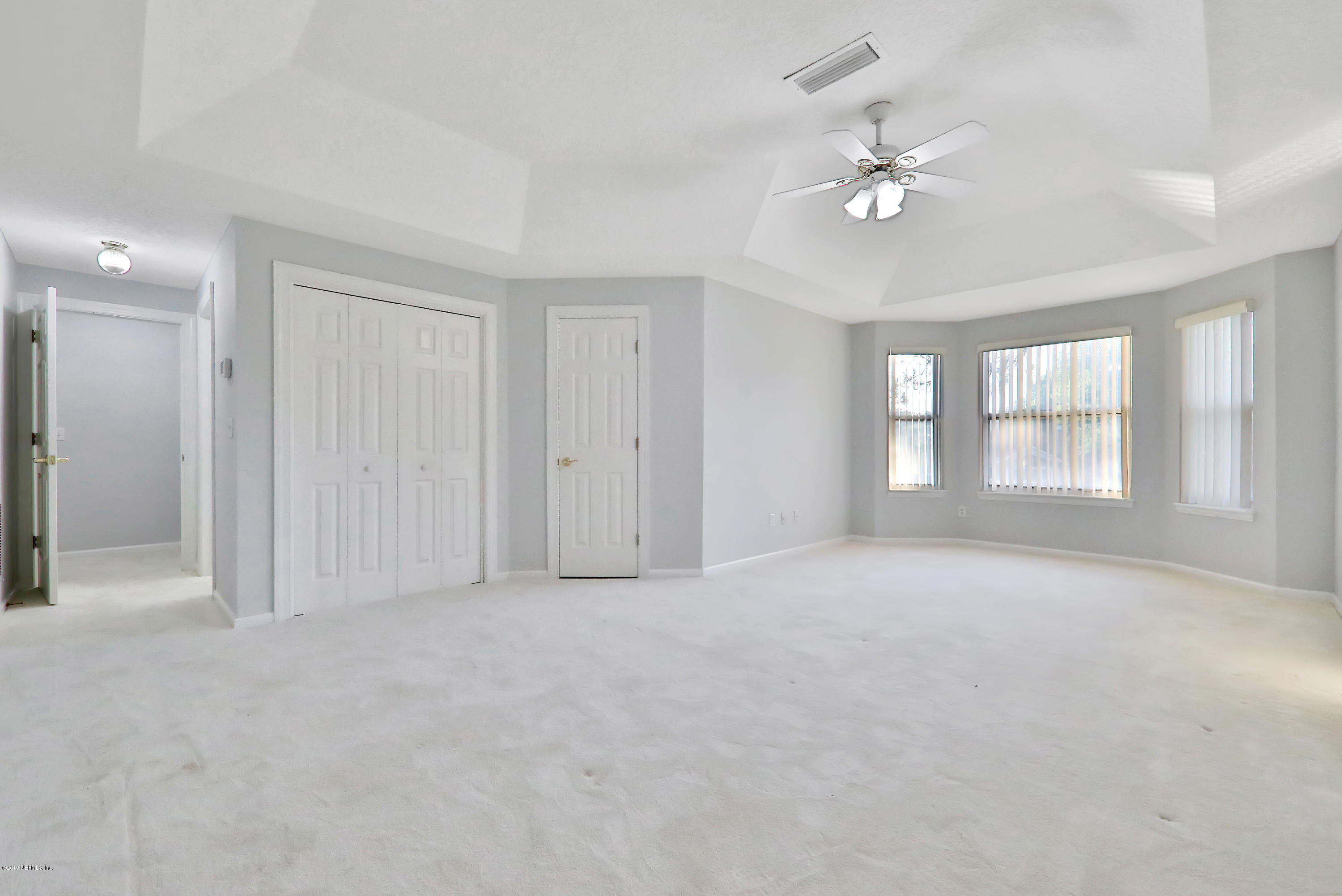 1444 Course View Drive Fleming Island, FL 32003 - Photo 46 of 61 a view of an empty room with a window