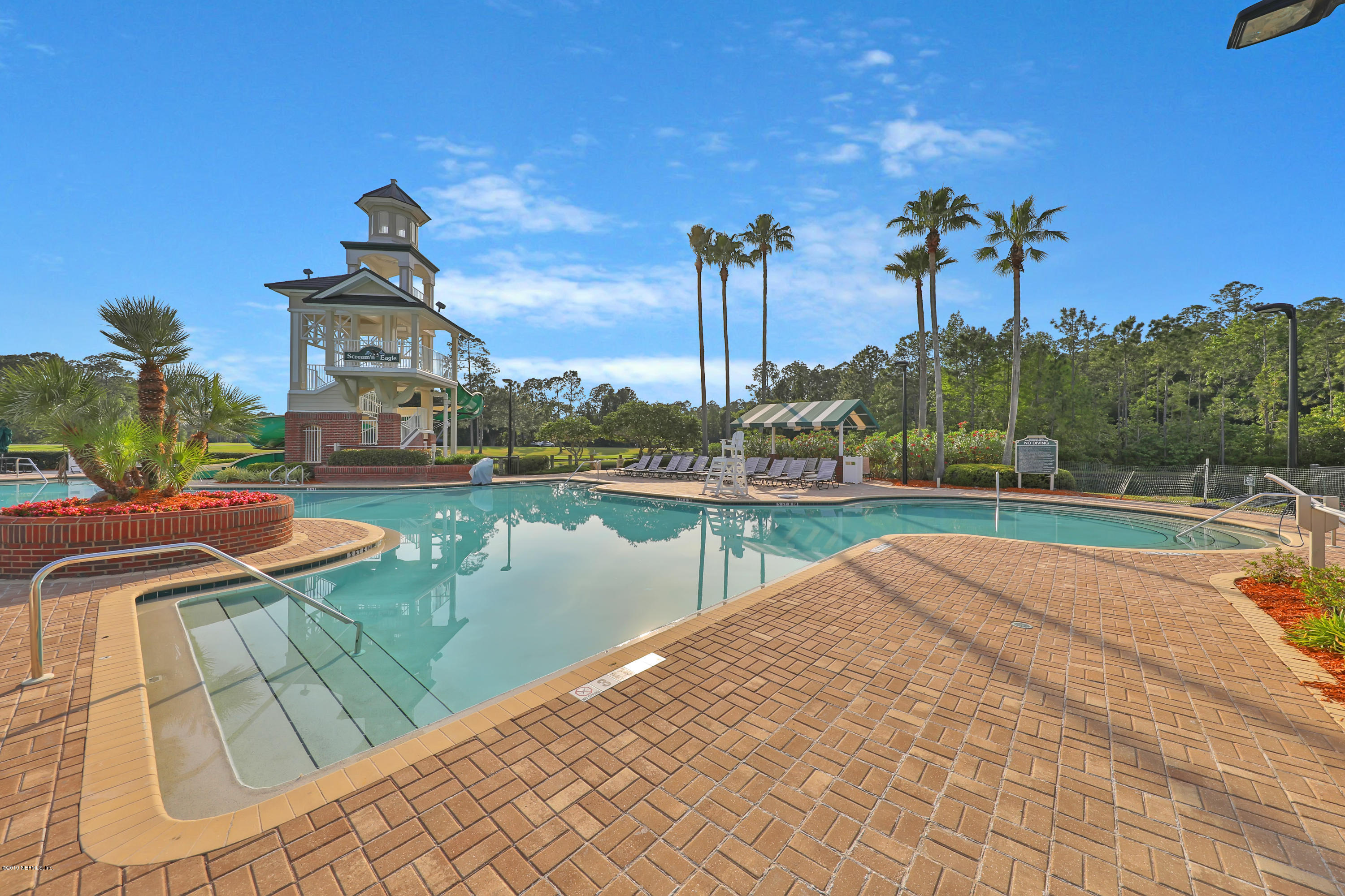 1444 Course View Drive Fleming Island, FL 32003 - Photo 52 of 61 a view of a lake with a house