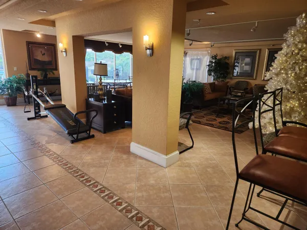 a view of a living room and bathroom