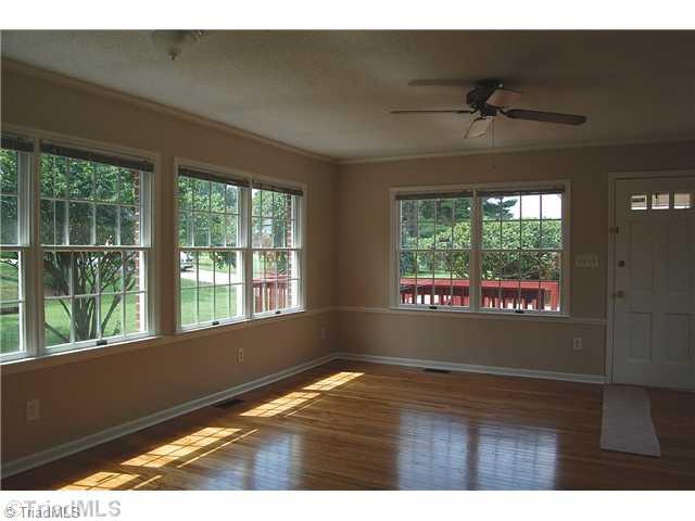 401 Lindley Road Greensboro, NC 27410 - Photo 2 of 16 Den/Family/Great Room. Wrapped with windows, this wonderful family room is flooded with light showing off the beautiful hardwood floors. The room overlooks the beautiful, expansive yard and the fig tree orchard across the drive.
