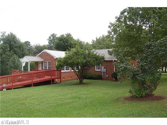 401 Lindley Road Greensboro, NC 27410 - Photo 16 of 16 Land/Lot. City living is normally confined to a lawn on a city lot. This home, right in the heart of Guilford College, offers a spacious wooded lot and orchard to be proud of.