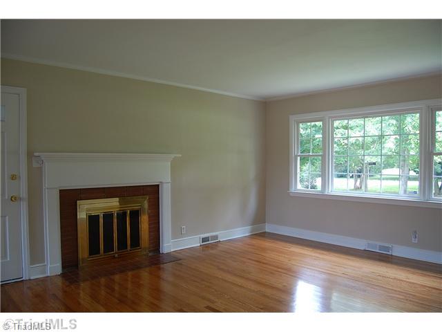 401 Lindley Road Greensboro, NC 27410 - Photo 5 of 16 Living Room. The glorious hardwood floors extend through the living room, dining room and three bedrooms.