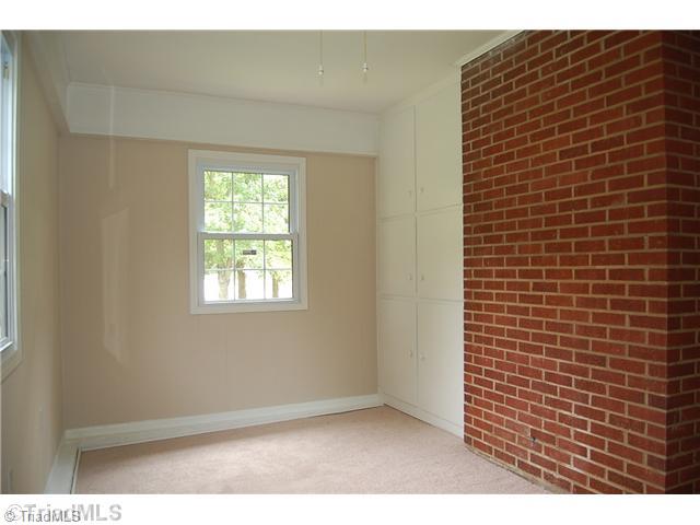 401 Lindley Road Greensboro, NC 27410 - Photo 8 of 16 Enclosed Porch. The enclosed porch is turnkey ready for multiple options...a play room, an office, a project center!
