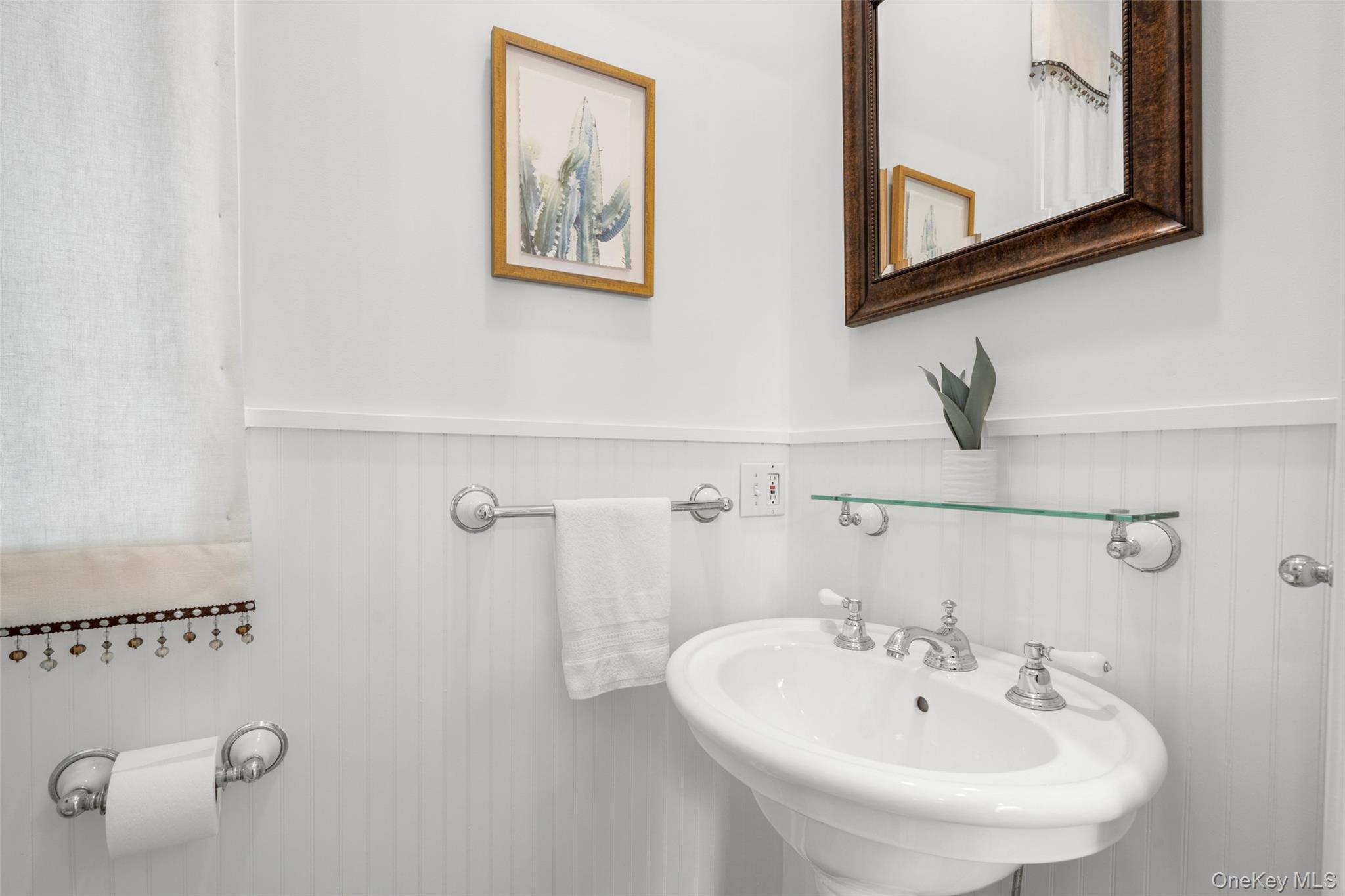 63 Rye Road Rye, NY 10580 - Photo 14 of 50 Powder room off the kitchen
