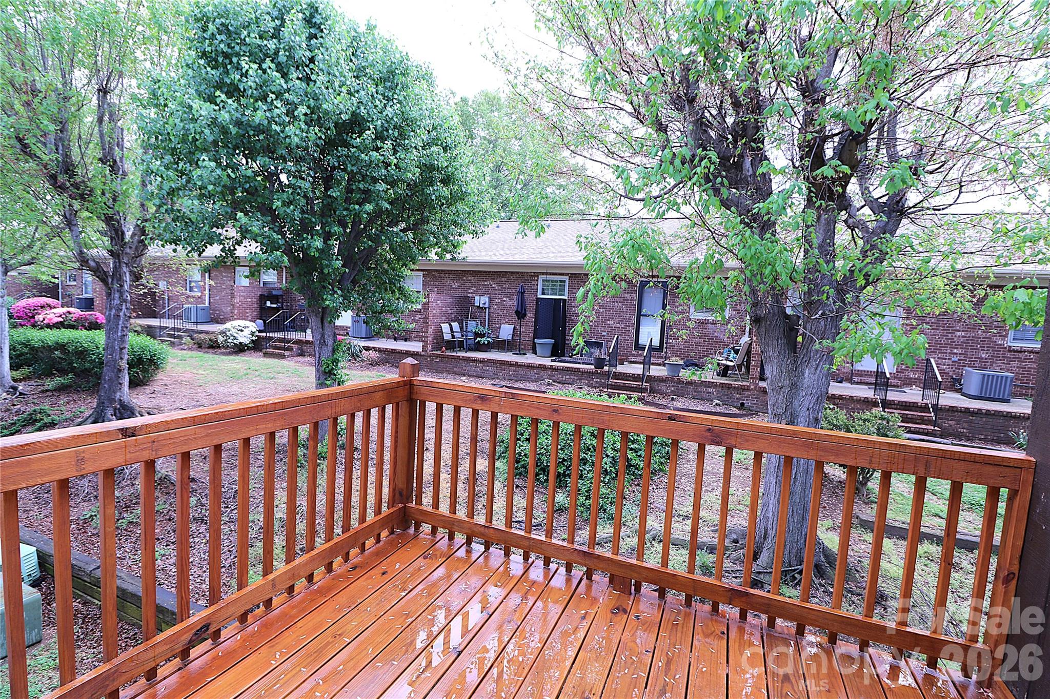 525 Southwest 12th Street Southwest, Unit 29 Hickory, NC 28602 - Photo 16 of 20 a view of a wooden deck with trees