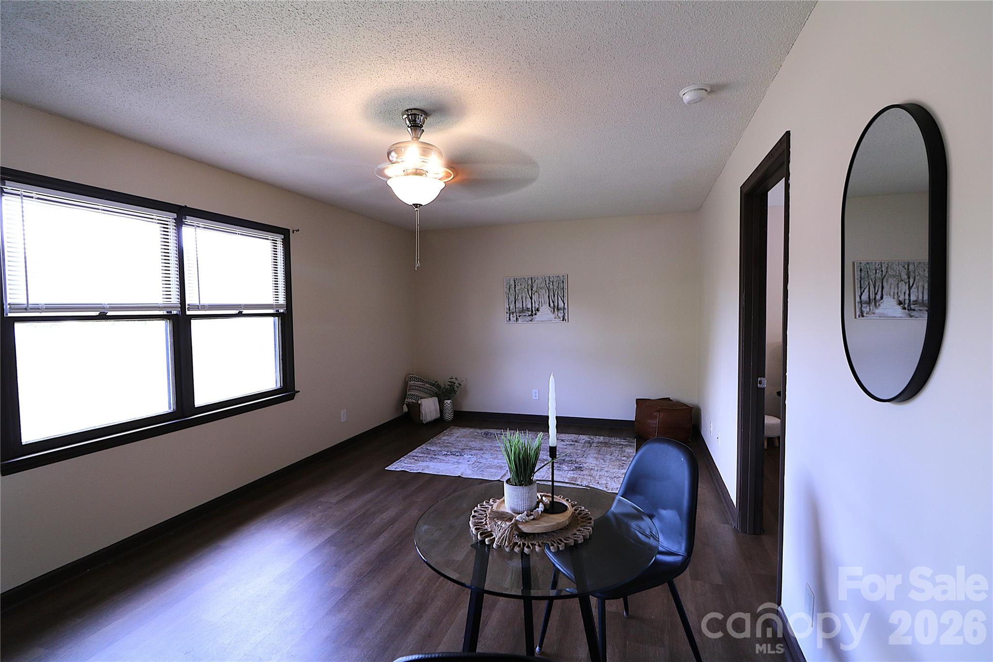 525 Southwest 12th Street Southwest, Unit 29 Hickory, NC 28602 - Photo 7 of 20 a view of a livingroom with furniture window and wooden floor