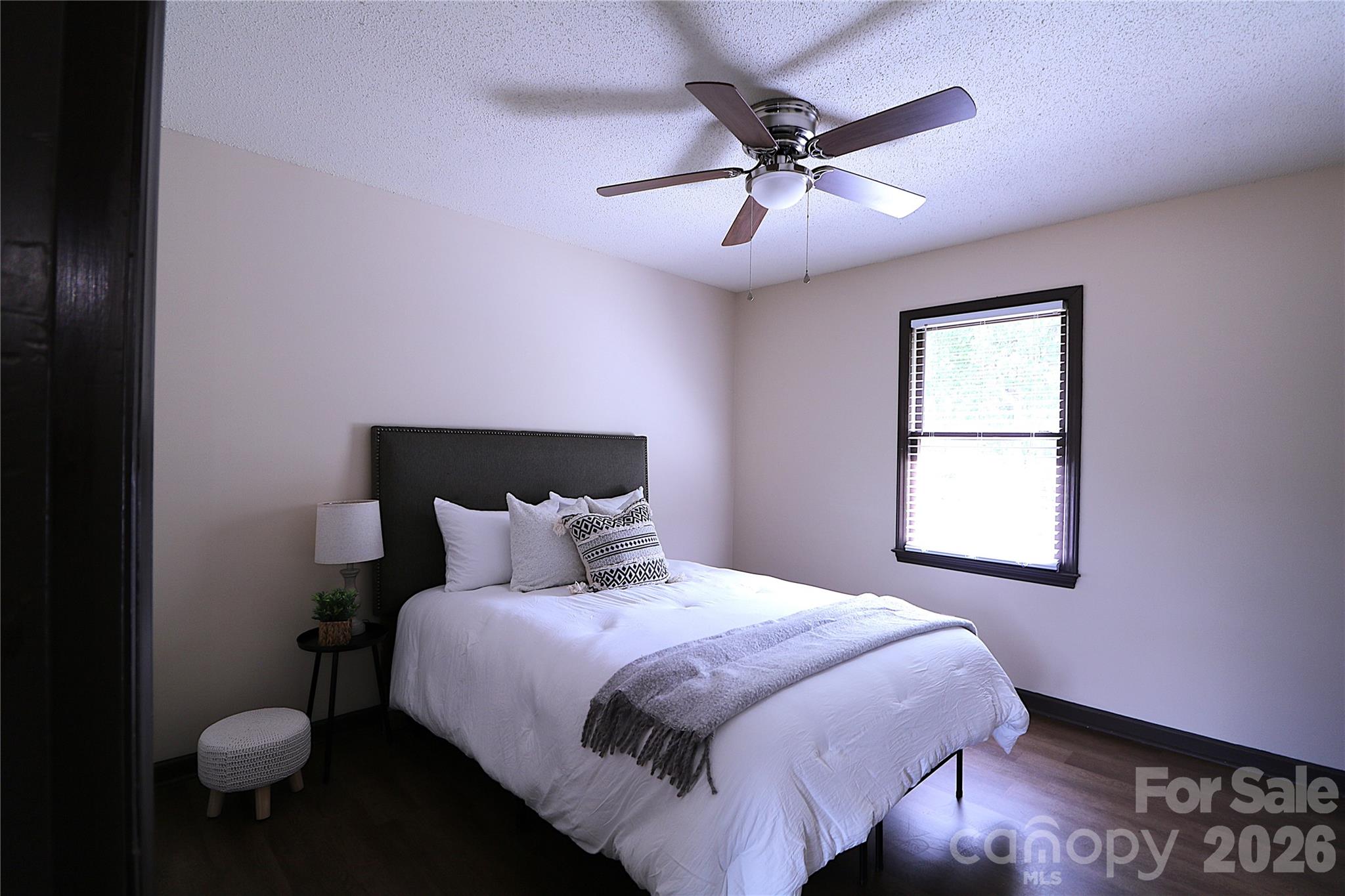 525 Southwest 12th Street Southwest, Unit 29 Hickory, NC 28602 - Photo 8 of 20 a bedroom with a bed and a window