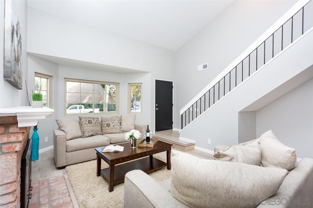 265 Argus Way Oceanside, CA 92057 - Photo 5 of 24 a living room with furniture and a table