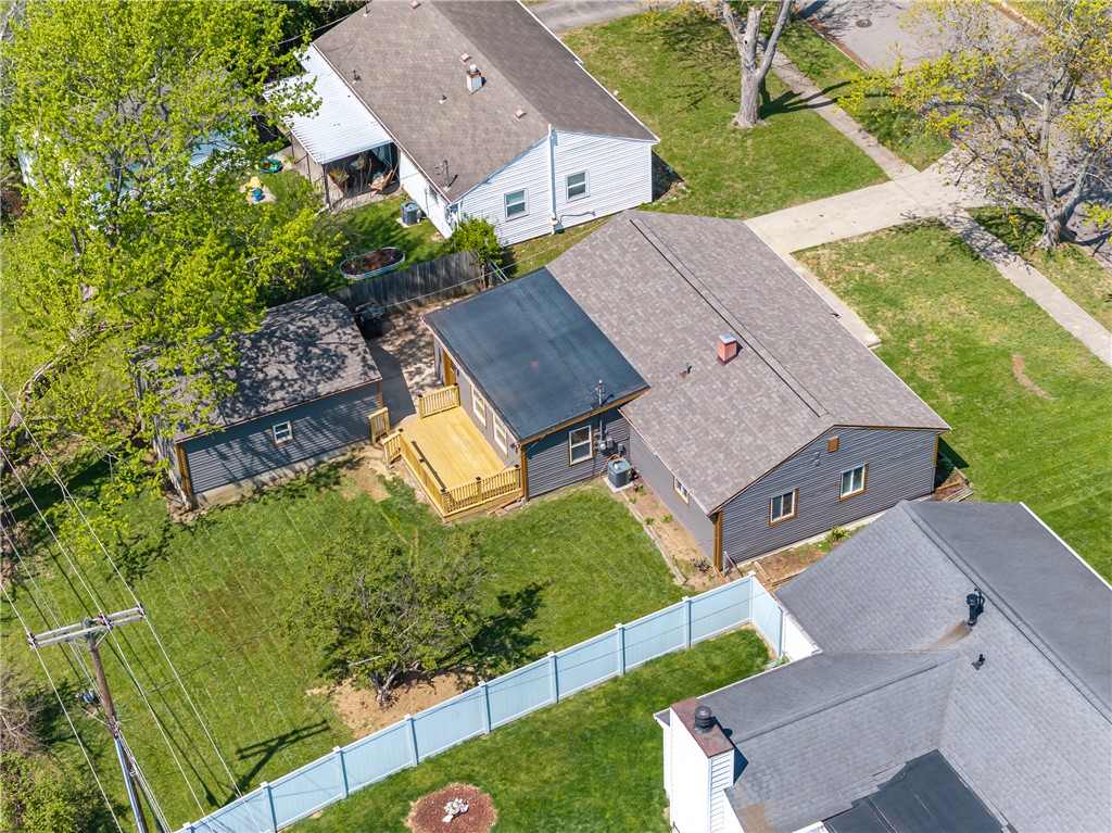 5240 Haverfield Road Dayton, OH 45432 - Photo 53 of 58 An aerial view captures the home's exterior, showcasing the deck and surrounding yard space.