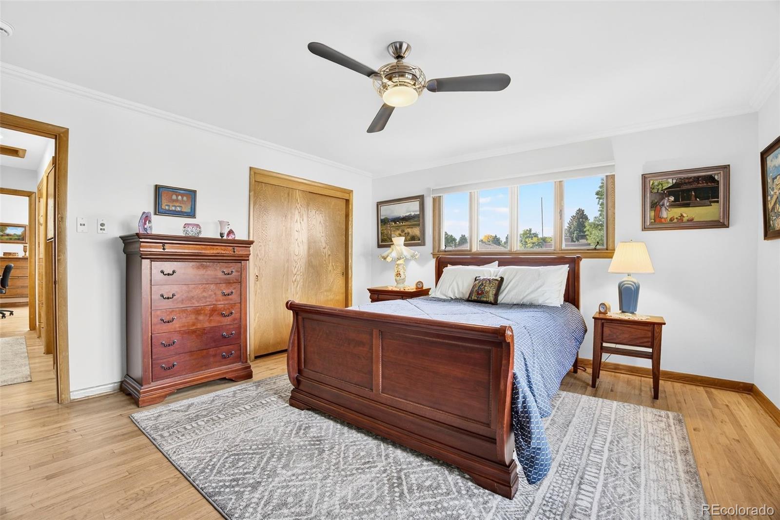 52 Hillside Drive Wheat Ridge, CO 80215 - Photo 14 of 48 a living room with furniture and a dresser