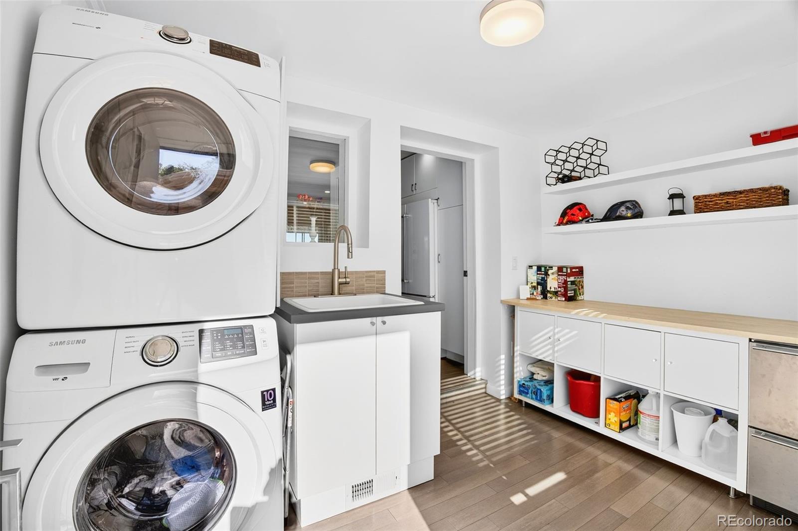 52 Hillside Drive Wheat Ridge, CO 80215 - Photo 25 of 48 a utility room with dryer and washer