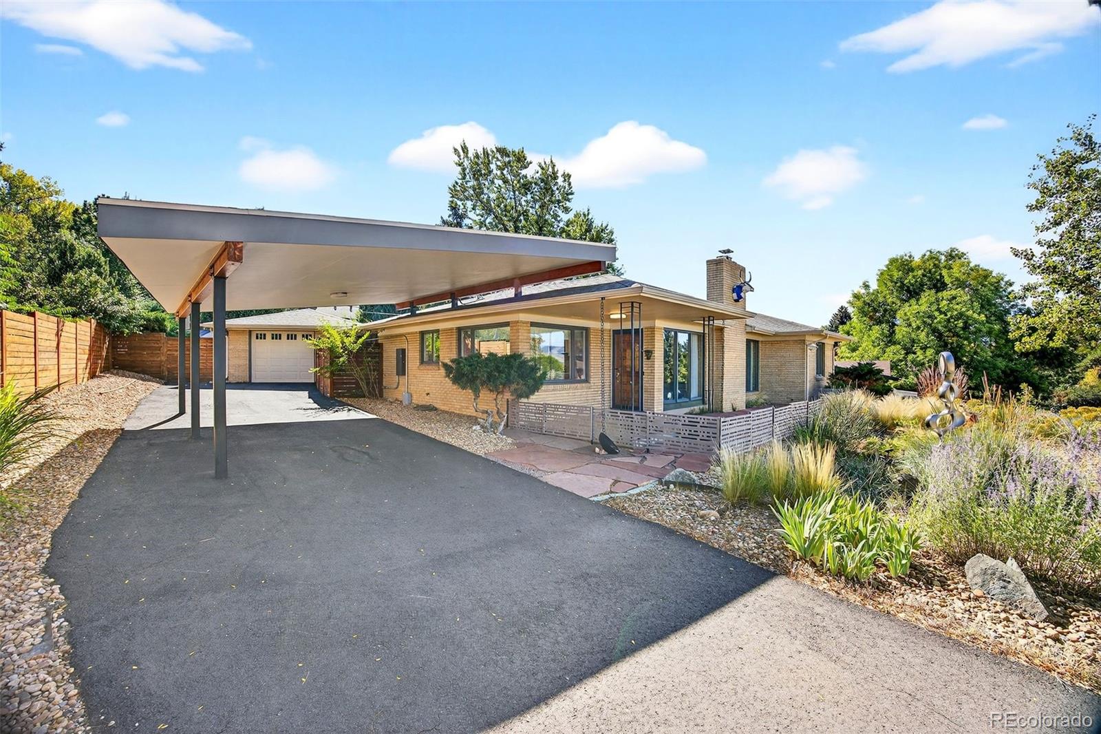 52 Hillside Drive Wheat Ridge, CO 80215 - Photo 39 of 48 a view of a house with a street