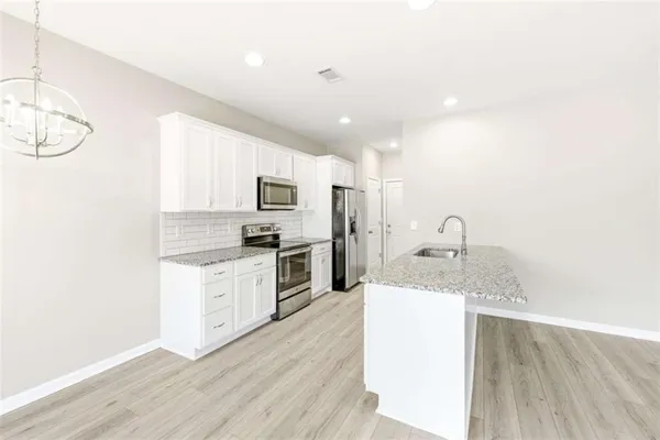a view of small space with wooden floor