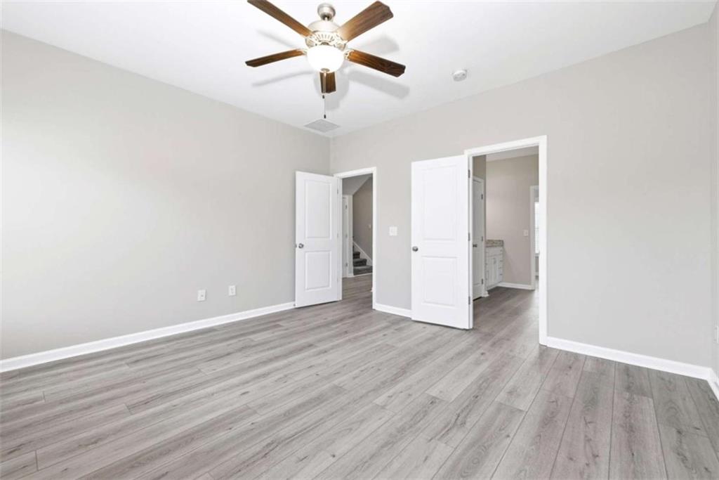 2066 Highway 63 Homer, GA 30547 - Photo 19 of 65 a view of an empty room and wooden floor