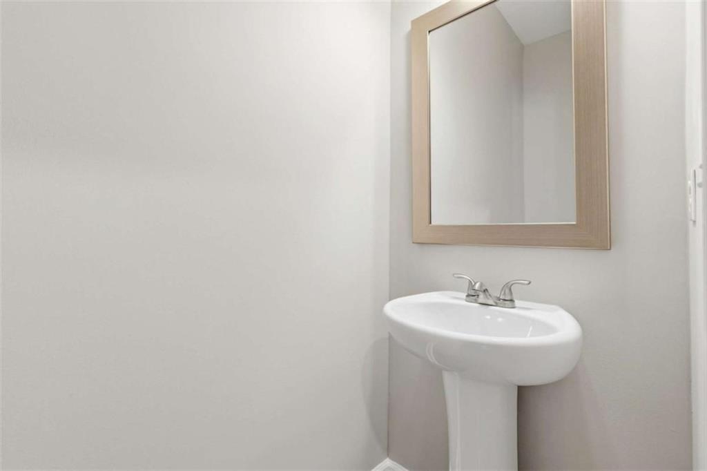 2066 Highway 63 Homer, GA 30547 - Photo 26 of 65 a bathroom with a sink and a mirror