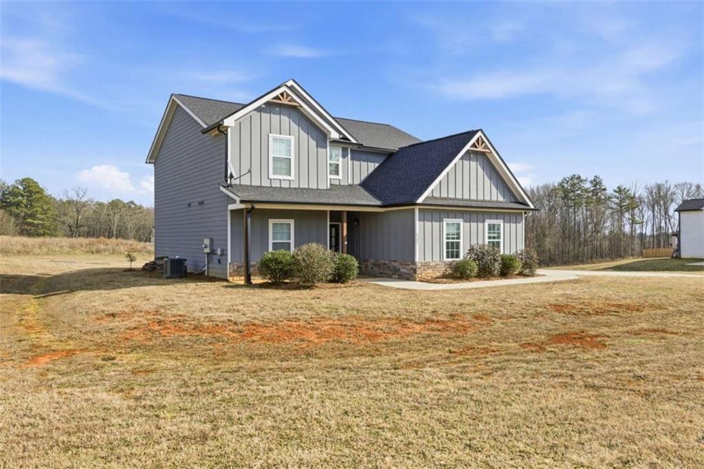 2066 Highway 63 Homer, GA 30547 - Photo 3 of 65 a front view of a house with a yard