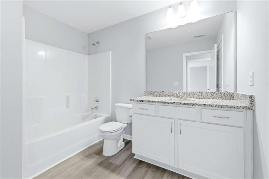 2066 Highway 63 Homer, GA 30547 - Photo 32 of 65 a bathroom with a sink toilet and shower