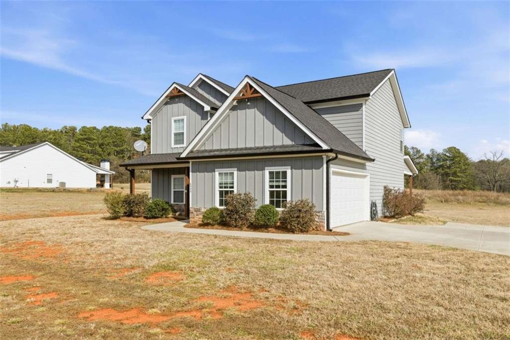 2066 Highway 63 Homer, GA 30547 - Photo 4 of 65 a front view of a house with a yard