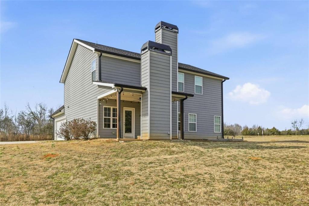 2066 Highway 63 Homer, GA 30547 - Photo 43 of 65 a front view of a house with a yard