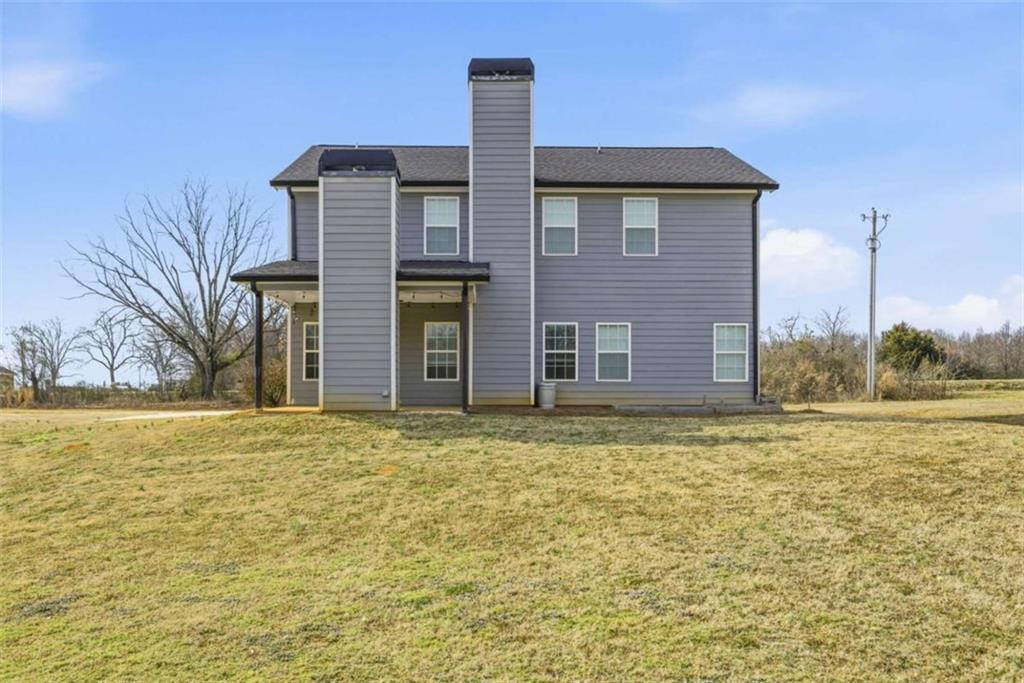 2066 Highway 63 Homer, GA 30547 - Photo 44 of 65 a front view of a house with a yard