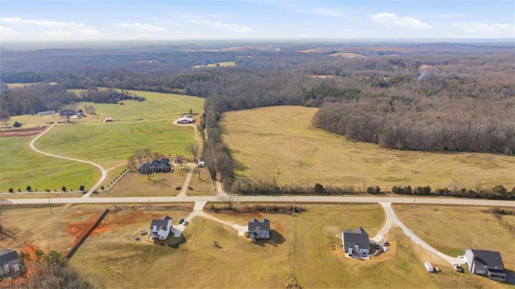 2066 Highway 63 Homer, GA 30547 - Photo 51 of 65 an aerial view of a house with a swimming pool