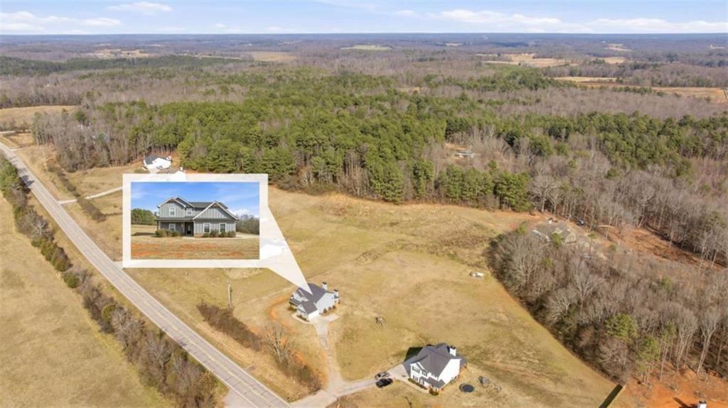 2066 Highway 63 Homer, GA 30547 - Photo 62 of 65 a view of a swimming pool with a mountain