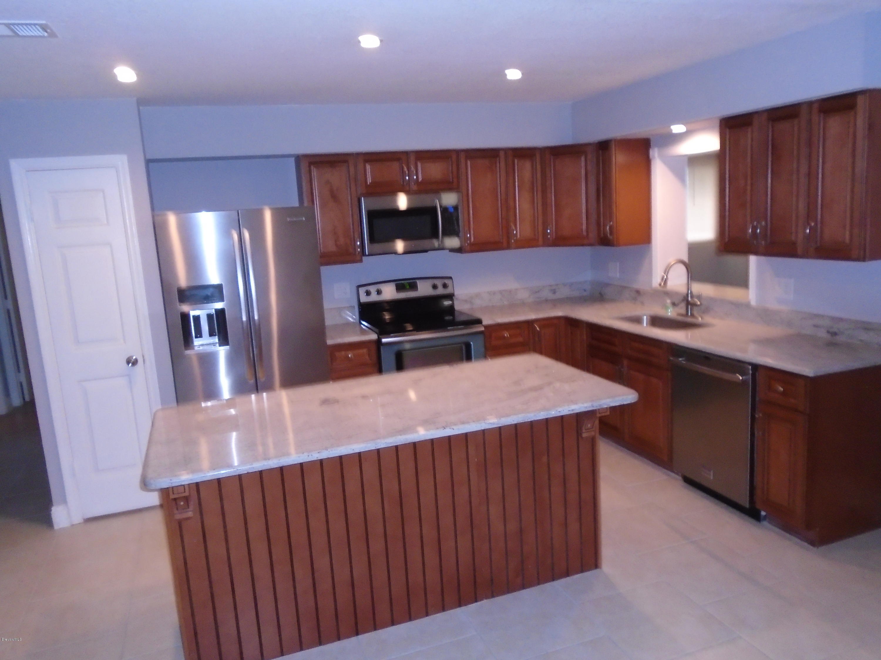 2364 Golfwood Road Melbourne, FL 32935 - Photo 2 of 13 KITCHEN