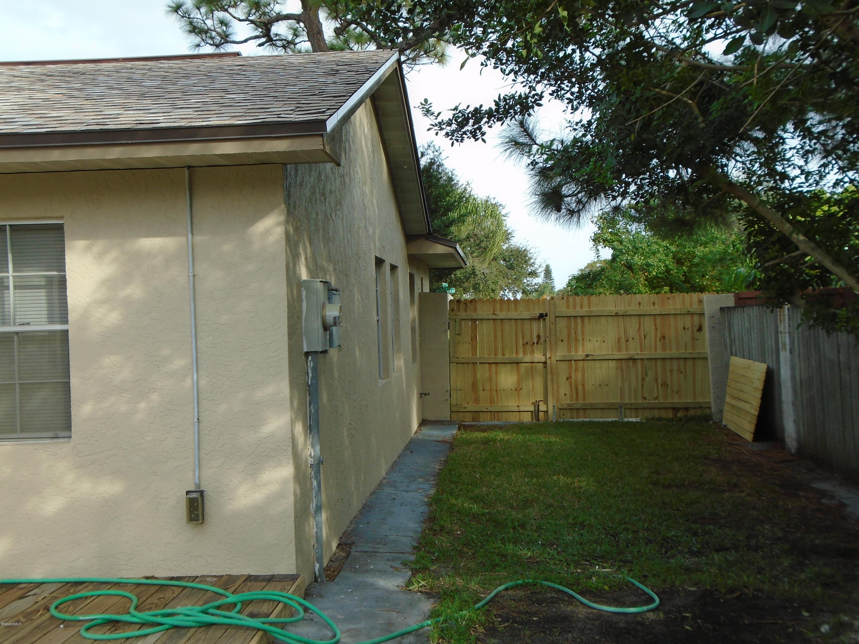 2364 Golfwood Road Melbourne, FL 32935 - Photo 13 of 13 SIDE YARD