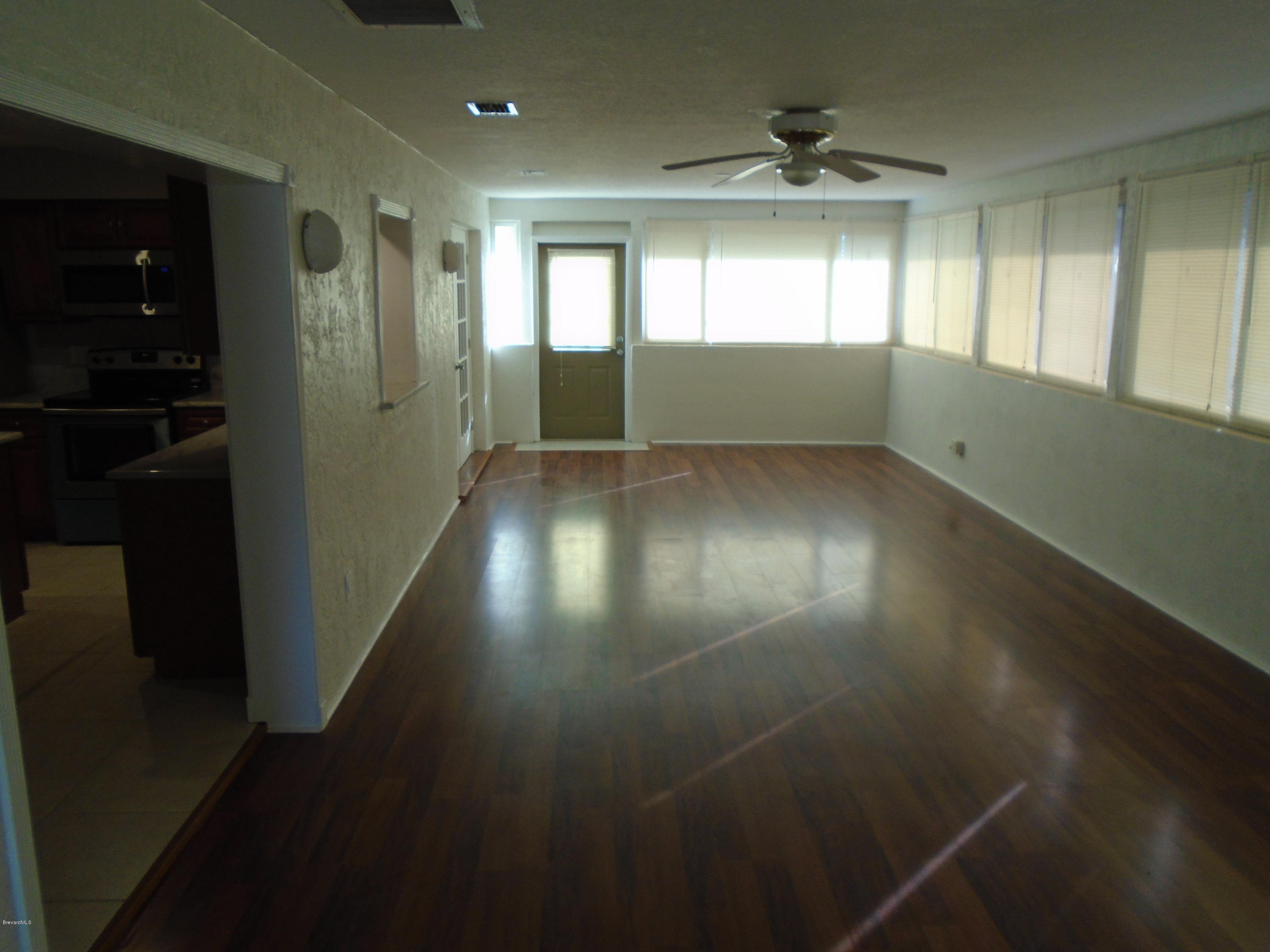2364 Golfwood Road Melbourne, FL 32935 - Photo 3 of 13 LARGE FAMILY ROOM