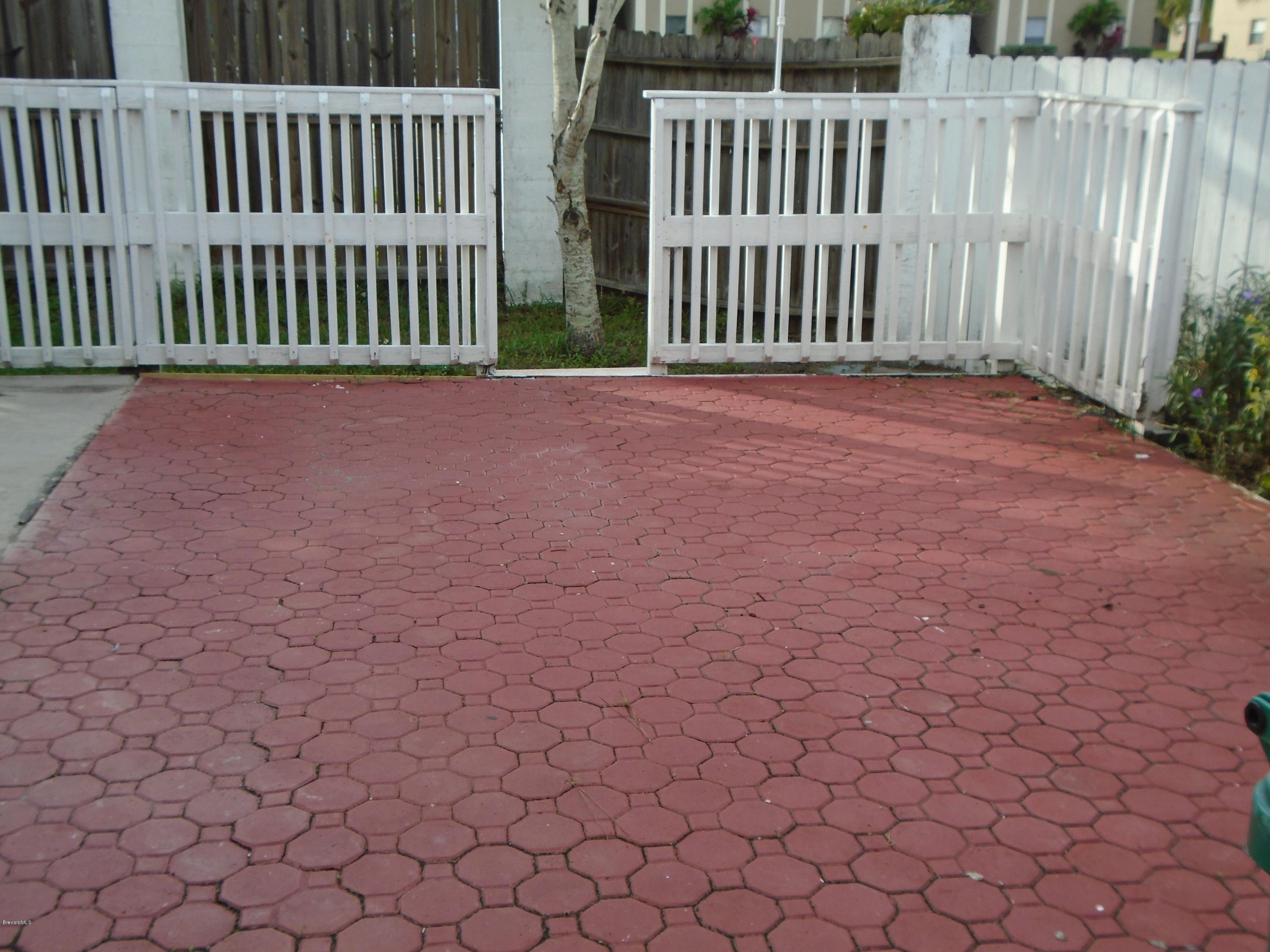 2364 Golfwood Road Melbourne, FL 32935 - Photo 10 of 13 BRICK PATIO