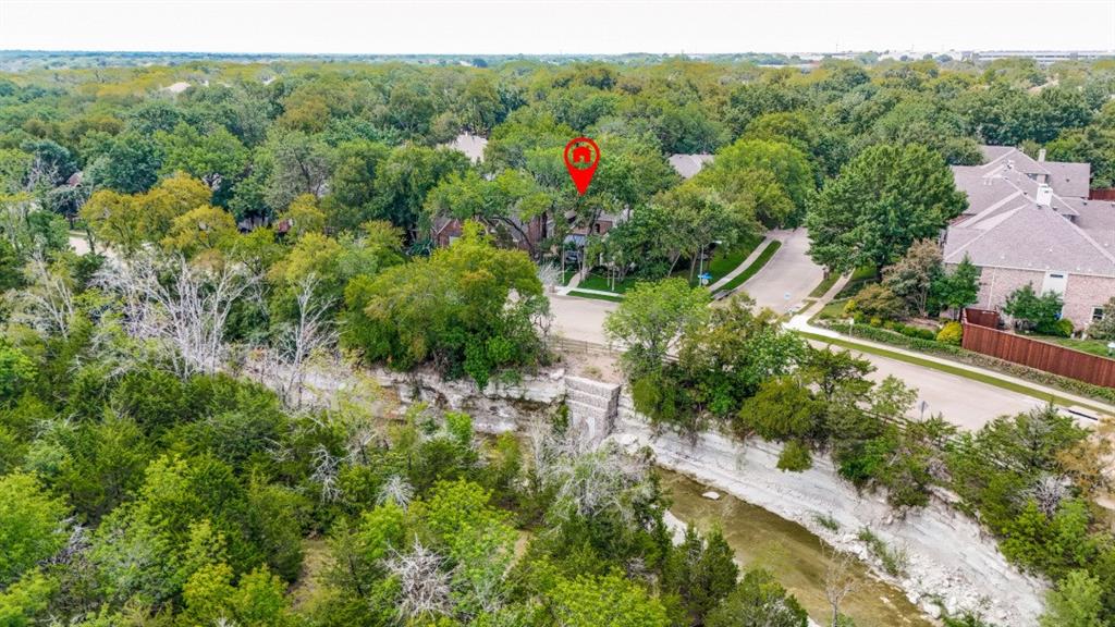 3400 Springbranch Drive Richardson, TX 75082 - Photo 37 of 37 a view of a city with lush green forest