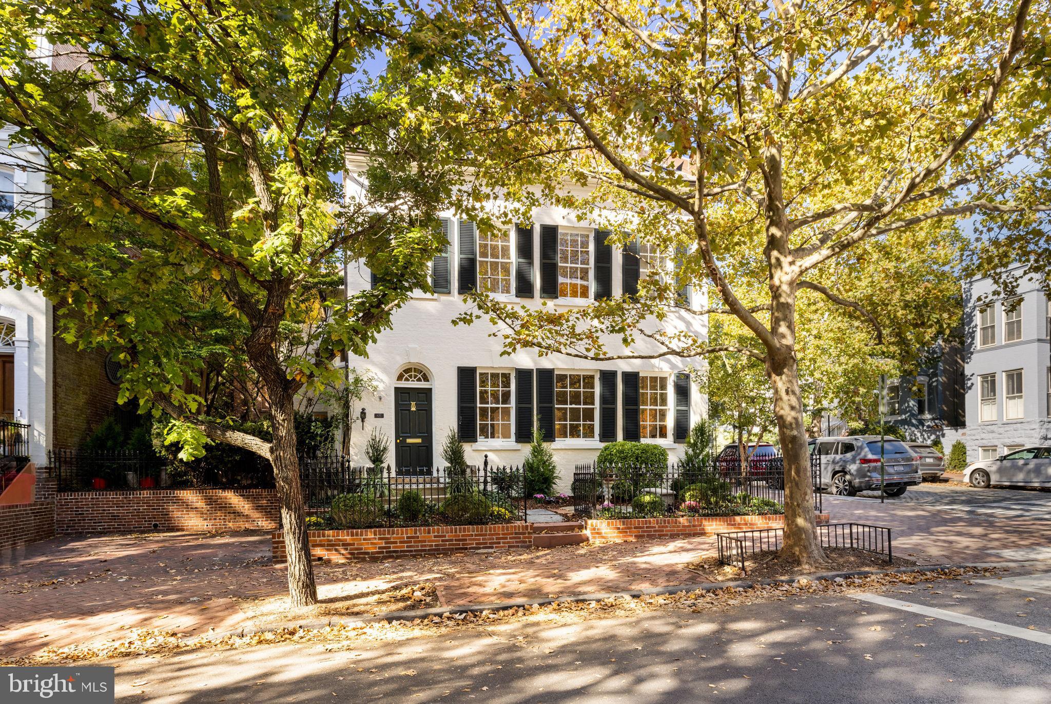 1430 33rd Street Northwest Washington, DC 20007 - Photo 1 of 1 a front view of a house with a tree