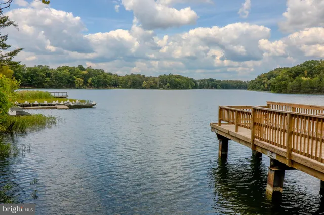 a view of a lake with a big yard